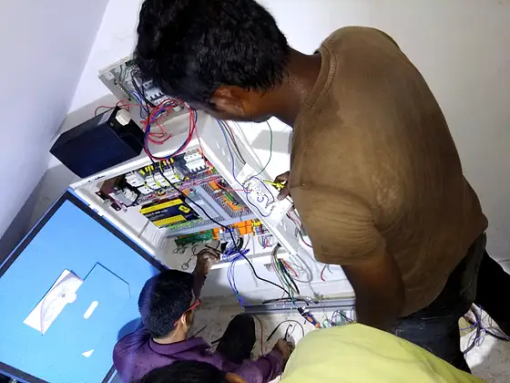 HLA crew at work: control panel and wiring